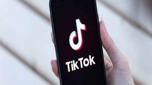 A phone displaying TikTok logo on the app