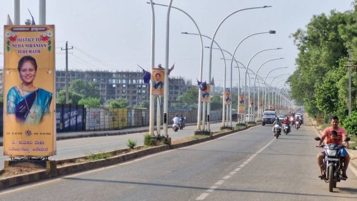 Posters reading ‘Justice to Neha Hiremath’ on lighting poles from the entrance to Hubballi city to the family home in Bidnal | Photo: Sharan Poovanna/ThePrint