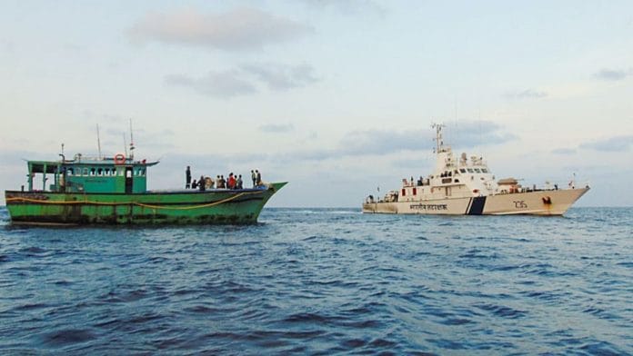 The Indian Coast Guard rescues a stranded fishing boat off Karwar, in Karnataka on Tuesday. |ANI