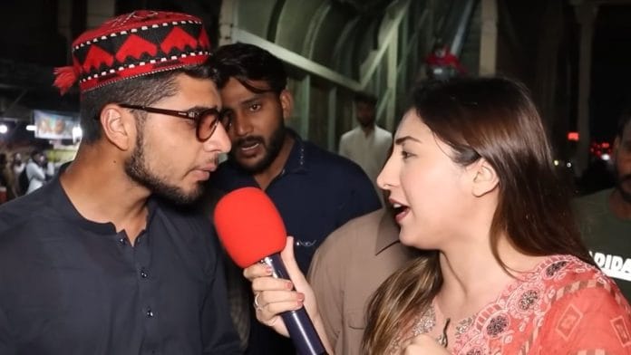 Screengrab from the YouTube video showing Shaila Khan talking to the man who attempted to cover her head with a scarf | YouTube