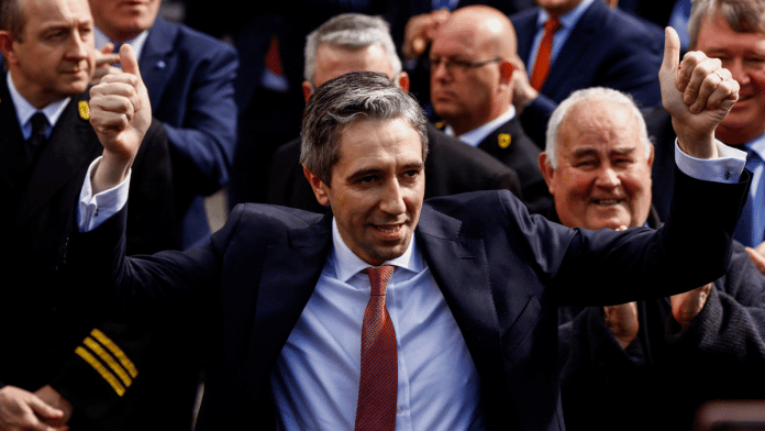 Taoiseach Simon Harris gestures after receiving a majority parliamentary vote to become the next Taoiseach (Prime Minister) of Ireland, in Dublin, Ireland | Reuters