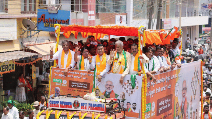 Goa CM Pramod Sawant (centre) campaigns for BJP candidate Vishweshwar Hegde Kageri (in garland) in Uttara Kannada | Pic credit: X/@DrPramodPSawant