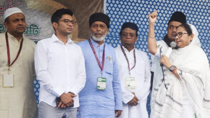 West Bengal Chief Minister and TMC supremo Mamata Banerjee with the party general secretary Abhishek Banerjee during a special prayer programme on the occasion of Eid-ul-Fitr at Red Road in Kolkata last week, where she appealed to migrant works to come back to the state and vote | ANI