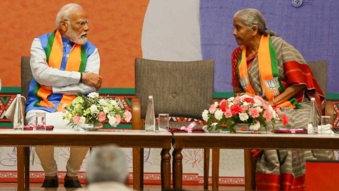 Prime Minister Narendra Modi and Finance Minister Nirmala Sitharaman at the launch of the BJP's manifesto for the 2024 Lok Sabha elections in New Delhi on 14 April | Suraj Singh Bisht | ThePrint