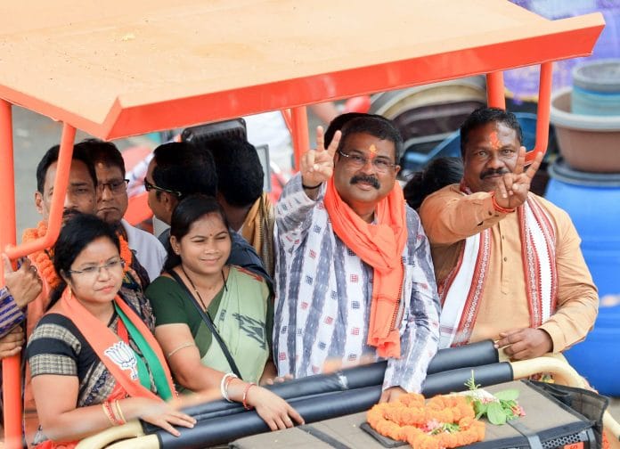 Union Education Minister and Bharatiya Janata Party (BJP) candidate from Sambalpur constituency Dharmendra Pradhan holds a roadshow in Sambalpur's Kuchinda Wednesday. | ANI