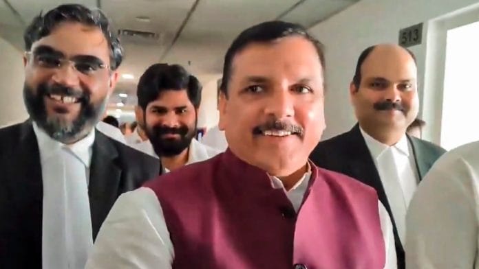 AAP leader Sanjay Singh leaves the Rouse Avenue Court | PTI