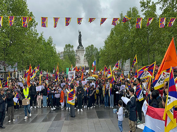 Paris: Campaigners for Tibet, Xinjiang protest as Chinese president Xi Jinping arrives in France