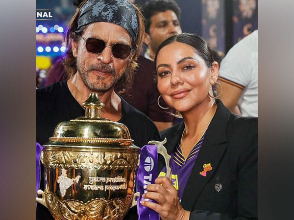 Shah Rukh Khan, Gauri pose with IPL trophy after KKR's big win