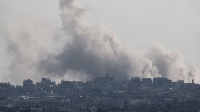 Smoke rises following an explosion in Gaza, amid the ongoing conflict between Israel and the Palestinian Islamist group Hamas, near the Israel-Gaza border, as seen from Israel, May 28, 2024. REUTERS/Amir Cohen