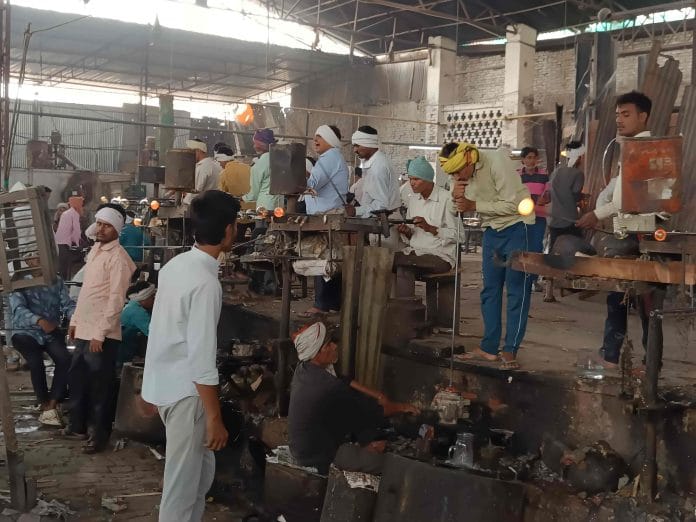 Workers at Nadar Bux & Co Glassworks in Firozabad | Krishan Murari | ThePrint