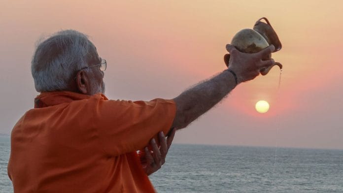 Prime Minister Narendra Modi offers prayers to the sun during his visit to the Vivekananda Rock Memorial to meditate, in Kanniyakumari on Friday | ANI Photo