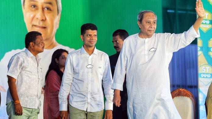 Odisha CM Naveen Patnaik at an election campaign event in the state’s Ganjam earlier this month. V.K. Pandian is seen with him | Photo: ANI