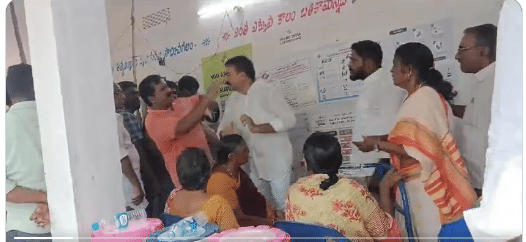 Screengrab of YSRCP MLA and voter caught in scuffle at polling booth | Pic credit: X