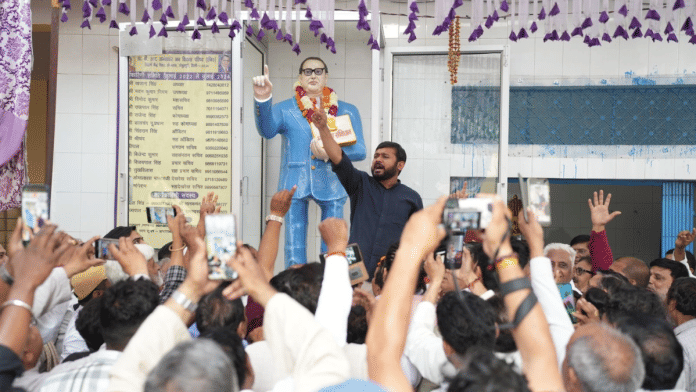 Congress's Kanhaiya Kumar raises slogans as Congress and AAP workers watch him at a campaign event | Pic credit: X/@kanhaiyakumar