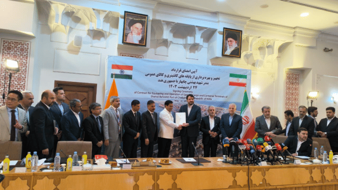 Union minister Sarbananda Sonowal and Mehrdad Bazrpash, Iran's Minister of Roads and Urban Development, after signing of agreement in Tehran on Monday | Pic credit: X/@MEAIndia