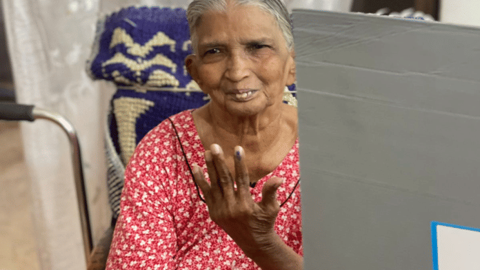 An elderly woman using the home voting facility in West Delhi | X (formerly Twitter)/ @CeodelhiOffice