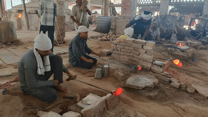 Employees at work at Nadar Bux & Co. glass factory in Firozabad | Krishan Murari | ThePrint