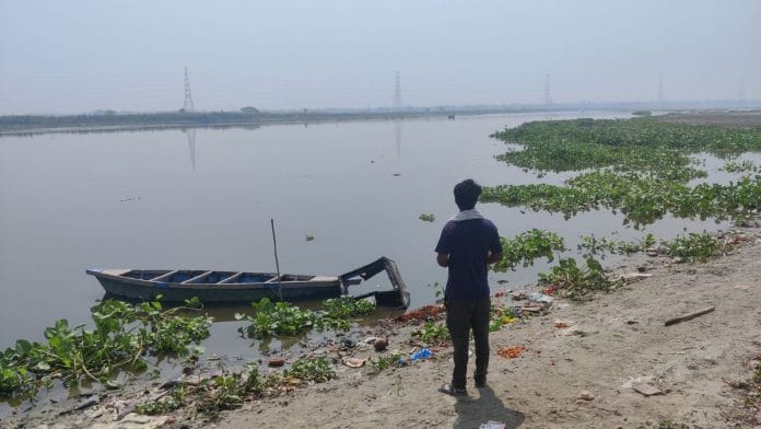 Mahendra Singh Halder, a fisherman from Jagatpur, waiting at the upper Wazirabad portion of Yamuna, to start his fishing venture for the day | Soumya Pillai | ThePrint