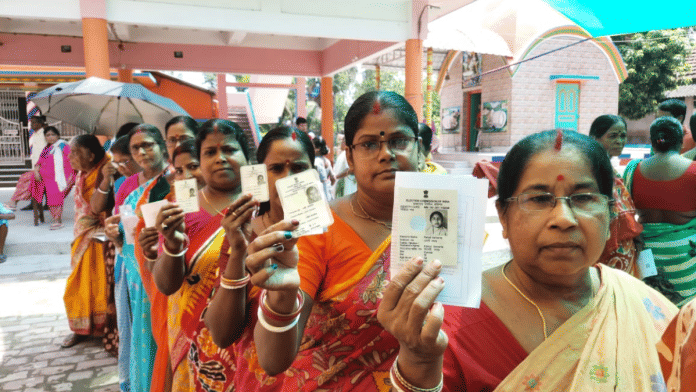 Women voters pose for the camera at a polling booth in West Bengal | X/@ECISVEEP