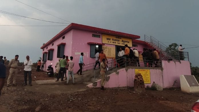 Parents and police personnel wait outside Sehatganj panchayat bhawan | Photo: Iram Nafis Siddique, ThePrint