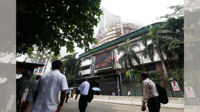 People walk past the Bombay Stock Exchange building in Mumbai | File photo | Reuters/Shailesh Andrade