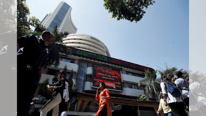 People walk past the Bombay Stock Exchange building in Mumbai | Representational image | Reuters/Francis Mascarenhas