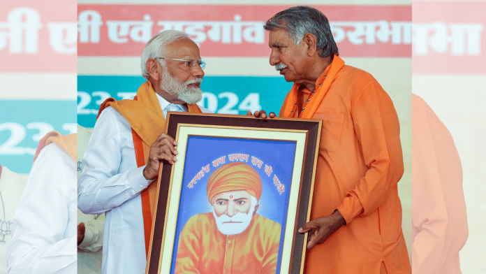 File photo of PM Narendra Modi with Bhiwani-Mahendragarh MP Dharambir Singh | ANI