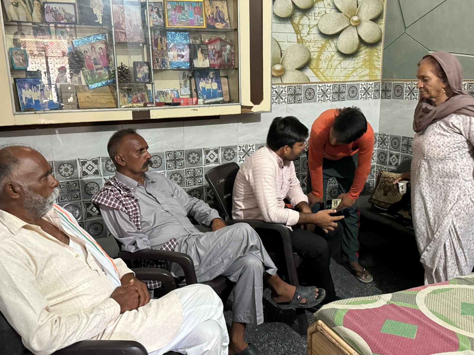 Mourners gathered at Anil's house, Devi Bai recounting the gruesome details of the murder.