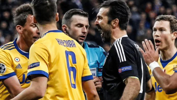 Referee Michael Oliver (in blue) is abused by Juventus goalkeeper Gianluigi Buffon during a 2018 Champions League tie | Representative Image | Reuters