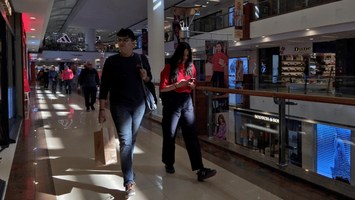Shoppers walk inside a shopping mall in New Delhi, India | File Photo | Reuters/Anushree Fadnavis