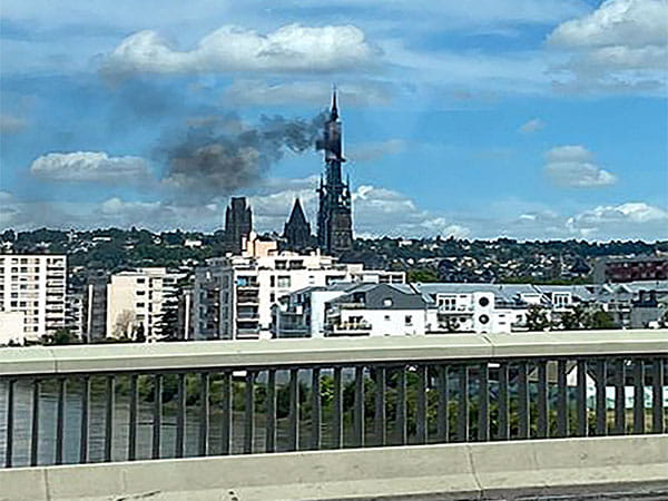 France's Notre Dame Cathedral evacuated after fire breaks out on spire