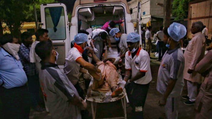 The staff of Hathras’ Bagla Hospital work quickly as they send the remains in ambulances for post-mortem | Manisha Mondal | ThePrint