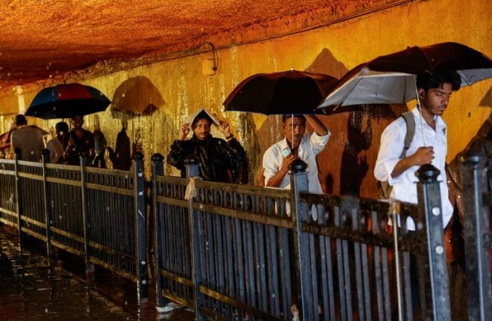 Monsoon rains bring floods, disrupting transport, in India's Mumbai ...