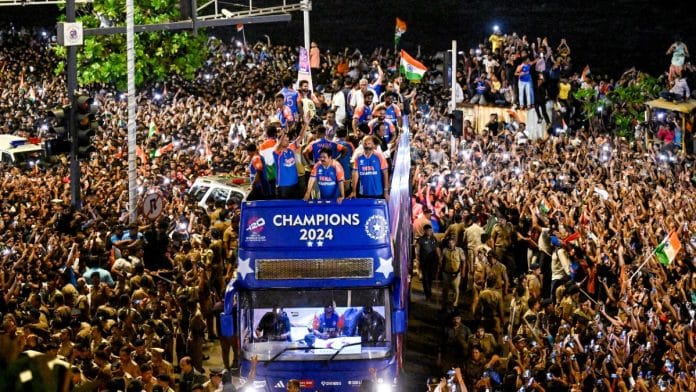 Team India winning squad atop open bus during victory parade in Mumbai, Thursday | ANI