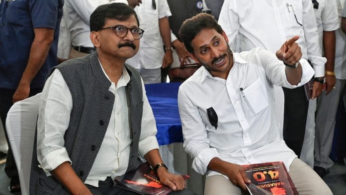 Shiv Sena (UBT) leader Sanjay Raut with former Andhra Pradesh chief minister YS Jagan Mohan Reddy at Jantar Mantar, New Delhi | ANI