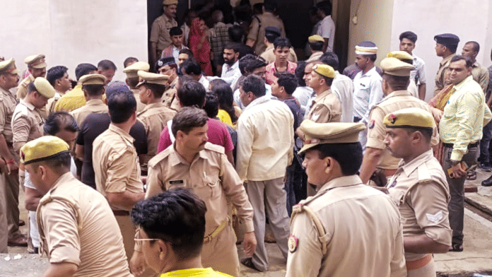 Police personnel outside a hospital in Etah where both dead and injured of Hathras stampede were brought Tuesday | ANI