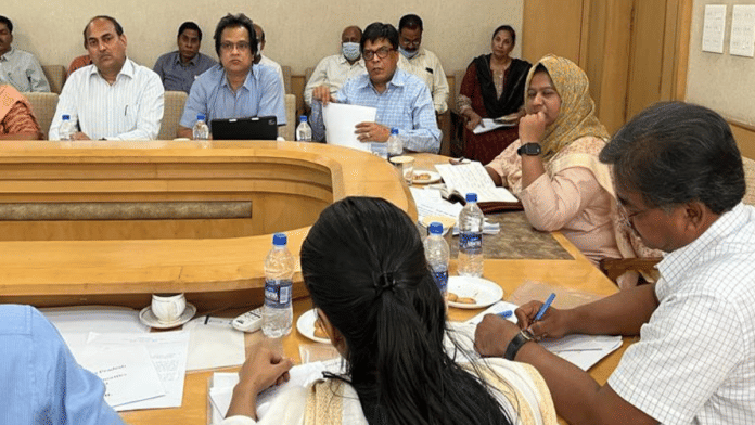 File photo of IAS officer Rajesh Rajora (with papers in his hand) at a meeting | X/@drrajeshrajora