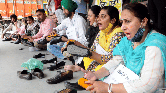 Government job-seekers demonstrate at a protest site | ANI File