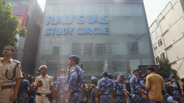 Police and RAF personnel outside Rau's office in Delhi's Old Rajinder Nagar on 27 July, 2024 | Suraj Singh Bisht/ThePrint