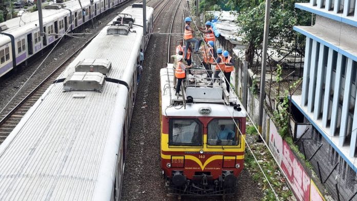 Maintenance workers on a section of railway line | Photo: ANI