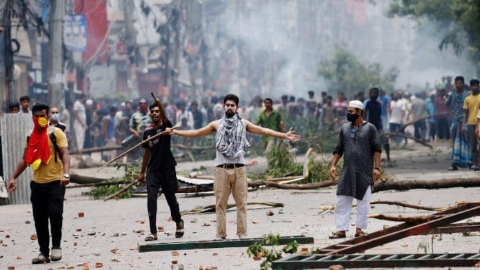 File photo of protesters clashing with the police in Dhaka, August 2024 | Mohammad Ponir Hossain | Reuters
