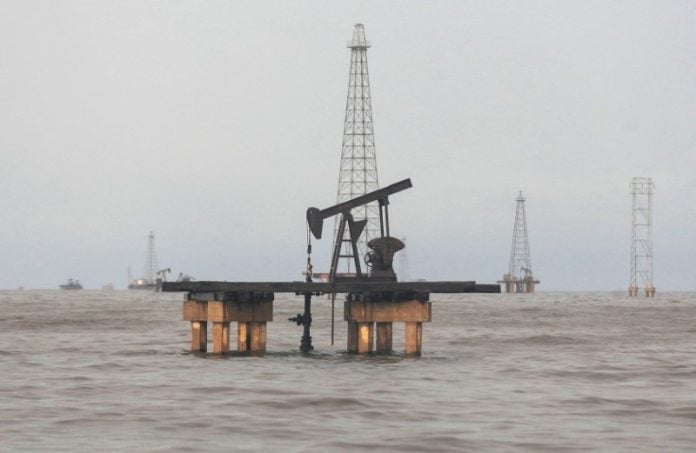 Oil prices settle 1% lower after surprise rise in US crude stockpiles ...