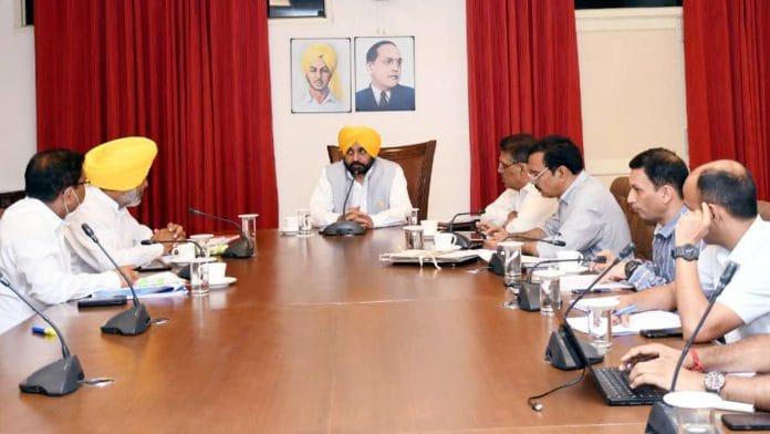 Punjab CM Bhagwant Mann at a meeting with Punjab finance minister Harpal Singh Cheema | Photo: ANI