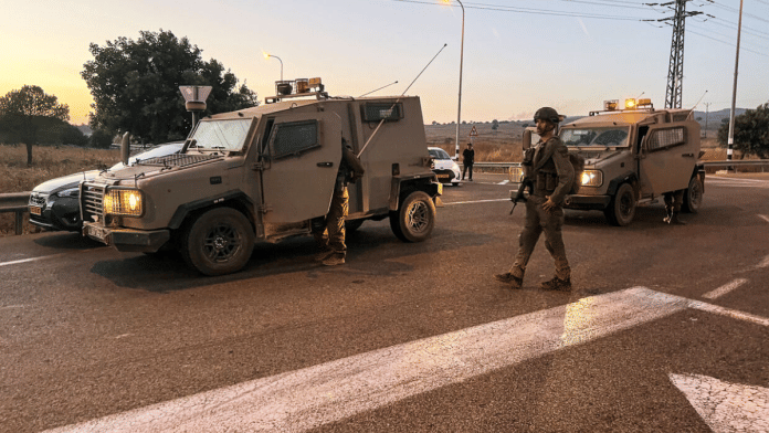 Israeli military block a road after Hezbollah launched projectiles at Israel, amid hostilities between Hezbollah and Israeli forces, near the Israel-Lebanon border, at the Israeli-occupied Golan Heights, 9 July, 2024 | Reuters/Avi Ohayon/File Photo