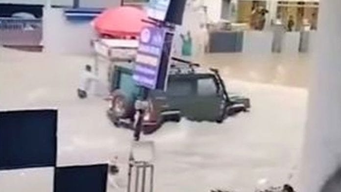 Still from purported video of Kathuria wading through waterlogged street in Old Rajinder Nagar in his SUV