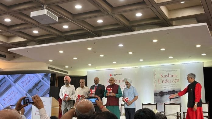Mahendra Sabharwal (fourth from left) with senior police officials and his son Manish Sabharwal at the book launch in Delhi’s IIC | Antara Baruah, ThePrint