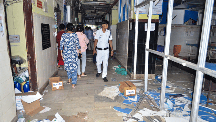 File photo of a policeman surveying the vandalised sections of RG Kar Hospital in Kolkata on Thursday | ANI