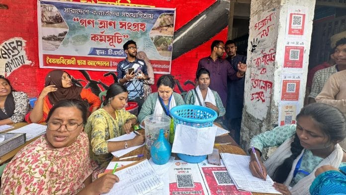 Rawnak Jahan (in yellow) and Ashrifa Khatoon (in floral) from the Dhaka University coordinate flood relief efforts, with other students, in Dhaka. | Ananya Bhardwaj | ThePrint