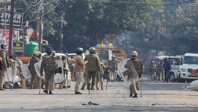 Police personnel at Haldwani's Banbhoolpura area a day after violence erupted over the demolition of an 'illegally-built' madrasa | Suraj Singh Bisht | ThePrint file photo