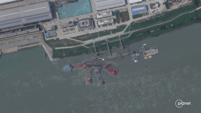 A series of satellite images from Planet Labs from June appear to show cranes at the Wuchang shipyard in Wuhan Shi, China, June 15, 2024. Planet Labs Inc | Reuters